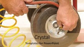  Presentation with tire - Presentation design having mechanic putting air in the small tire of a hand cart background and a yellow colored foreground