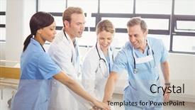  Presentation with team leader - Cool new slide deck with medical team hands stacked backdrop and a soft green colored foreground