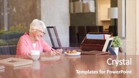  Presentation with book and pen - Presentation theme consisting of memoire - senior woman writing memoirs background and a coral colored foreground