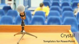  Presentation with microphone - Amazing presentation theme having microphone on a panel table backdrop and a yellow colored foreground