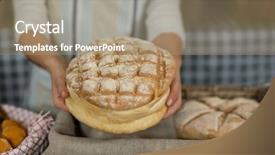  Presentation with staff - Cool new theme with mid section of female staff offering round loaf of bread at counter in bake shape backdrop and a coral colored foreground