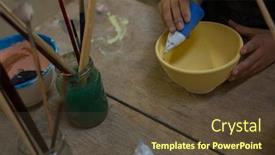  Presentation with pottery - Beautiful presentation theme featuring mid-section-of-girl-painting backdrop and a tawny brown colored foreground