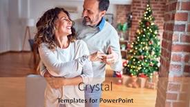 Presentation with dancing - Presentation theme featuring middle age beautiful couple smiling happy and confident standing and dancing around christmas tree at home background and a coral colored foreground