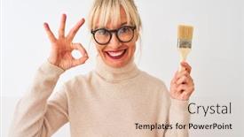  Presentation with paint brush - Colorful slides enhanced with middle age painter woman holding paint brush standing over isolated white background doing ok sign with fingers excellent symbol backdrop and a lemonade colored foreground