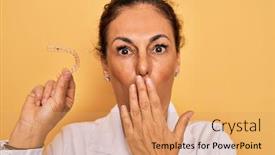  Presentation with correction - Amazing PPT theme having middle-age-senior-dentist-woman backdrop and a coral colored foreground