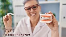  Presentation with dentist - PPT theme consisting of middle-age-woman-wearing-dentist background and a soft green colored foreground