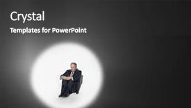  Presentation with spotlight - Theme having middle aged businessman sitting in spotlight background and a dark gray colored foreground