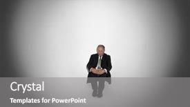  Presentation with spotlight - Amazing presentation theme having middle aged businessman sitting in spotlight backdrop and a gray colored foreground