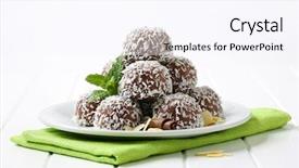  Presentation with dark homemade chocolate bars - Colorful presentation enhanced with mild green - dark chocolate pralines with grated backdrop and a sky blue colored foreground