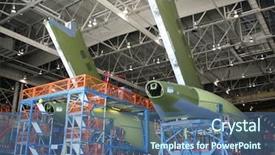  Presentation with aerospace - Amazing PPT layouts having military aircraft - inside aerospace manufacturing plant backdrop and a ocean colored foreground