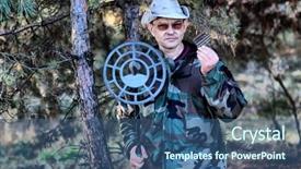  Presentation with metal detector - Beautiful PPT theme featuring military archeology man with metal backdrop and a ocean colored foreground