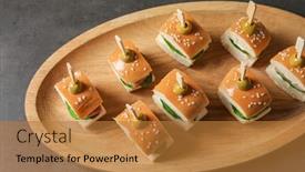  Presentation with baby shower - PPT layouts consisting of mini burgers for baby shower party on table background and a gold colored foreground