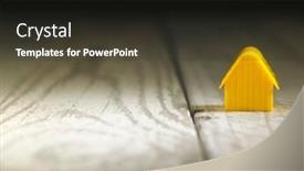  Presentation with wooden toy - Cool new PPT theme with miniature-yellow-toy-house backdrop and a tawny brown colored foreground