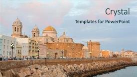  Presentation with diversity spain children - PPT theme with missionary church - cathedral in cadiz at dusk background and a sky blue colored foreground
