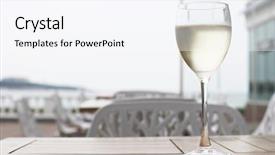  Presentation with sea glass - Slide set with misted glass of white wine standing on the table in sea-side cafe background and a white colored foreground