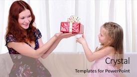  Presentation with gift ribbon - Audience pleasing theme consisting of mom gives a holiday gift backdrop and a coral colored foreground