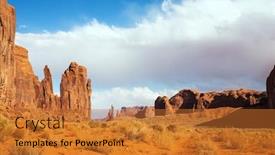  Presentation with indian monument - Slide deck having monument-valley-is-a-unique background and a gold colored foreground