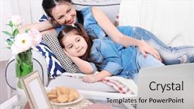  Presentation with cartoons - Cool new theme with mother and daughter watching cartoons backdrop and a soft green colored foreground