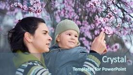  Presentation with early years - PPT layouts enhanced with mother and her 2 years old child enjoy the early spring between flowers background and a ocean colored foreground