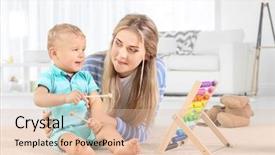  Presentation with baby toy - PPT theme with mother playing with toy abacus background and a lemonade colored foreground