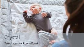  Presentation with diaper - Presentation consisting of mother-puts-a-romper-suit background and a lemonade colored foreground