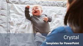  Presentation with baby diapers - PPT theme enhanced with mother-puts-a-romper-suit background and a ocean colored foreground