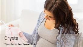  Presentation with motherhood - Slide deck consisting of motherhood pregnancy people and kids clothing concept - close up of happy woman holding and looking at pink baby girls bodysuit at home background and a lemonade colored foreground