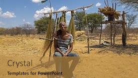  Presentation with kalahari - Audience pleasing PPT theme consisting of motswana-african-woman backdrop and a gold colored foreground