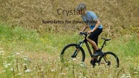  Presentation with mountain bike - Beautiful slides featuring mountain biker riding his bike through the blooming meadow backdrop and a coral colored foreground
