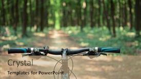  Presentation with biking - Amazing PPT theme having mountain biking down hill descending fast on bicycle view from bikers eyes backdrop and a coral colored foreground