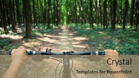  Presentation with biking - Slide set consisting of mountain biking down hill descending fast on bicycle view from bikers eyes background and a coral colored foreground