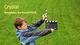  Presentation with clapper - Cool new presentation theme with movie camera - boy in jacket with cinema backdrop and a tawny brown colored foreground