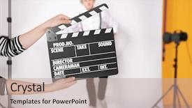  Presentation with movie studio - Colorful slides enhanced with movie clapper and young man backdrop and a coral colored foreground