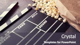  Presentation with salty - Audience pleasing theme consisting of movie clapper with salty popcorn backdrop and a dark gray colored foreground