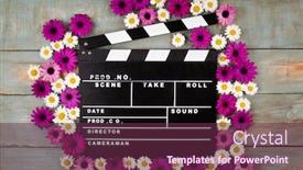  Presentation with clapper - Slide set enhanced with movie-clapper-with-flowers background and a tawny brown colored foreground