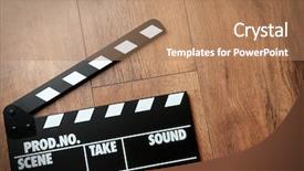  Presentation with movie - PPT theme enhanced with movie clapperboard on wooden background background and a coral colored foreground