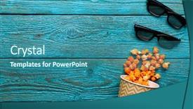  Presentation with popcorn movie - Amazing slide deck having movie clip - paper cup with popcorn backdrop and a ocean colored foreground