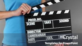  Presentation with clapper - Theme featuring movie production clapper board background and a tawny brown colored foreground