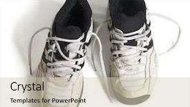  Presentation with running shoes - Presentation enhanced with mud run - old running shoes with white background and a soft green colored foreground