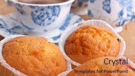  Presentation with blue floral - Presentation theme consisting of muffins with coffee in white and blue floral patterned china background and a gold colored foreground
