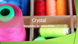  Presentation with multicolor thread - Presentation theme consisting of multicolor sewing thread in wooden background and a coral colored foreground