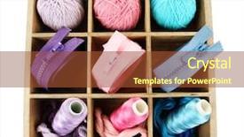  Presentation with thread - PPT layouts consisting of multicolored skeins of thread and fasteners in box isolated on white background and a tawny brown colored foreground
