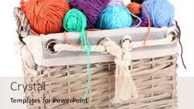  Presentation with yarn - Presentation theme enhanced with multicoloured knitting yarn in basket isolated on white background and a coral colored foreground