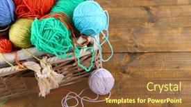  Presentation with yarn - Beautiful presentation featuring multicoloured knitting yarn in basket on wooden background backdrop and a tawny brown colored foreground