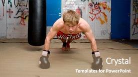  Presentation with graffiti - PPT theme featuring muscular looking boxer doing press-ups in a graffiti clad suburban basement focus on the dorsal muscles and biceps background and a coral colored foreground