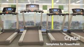  Presentation with fitness - Beautiful slide deck featuring muscular system - image of treadmills backdrop and a gray colored foreground