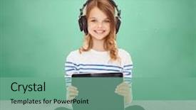  Presentation with green technology - Audience pleasing slides consisting of music technology people and childhood concept - happy girl with headphones showing tablet pc computer blank screen over green chalk board background backdrop and a seafoam green colored foreground