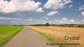  Presentation with agricultural micro irrigation - Slides having narrow road through agricultural fields background and a yellow colored foreground