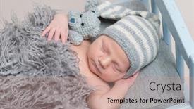  Presentation with baby toy - Slide deck with newborn baby sleeping on a bed in a gray knitted suit with a lovely toy background and a coral colored foreground