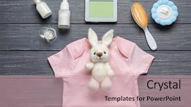  Presentation with newborn baby - Beautiful PPT theme featuring newborn screening - composition with baby accessories backdrop and a soft green colored foreground